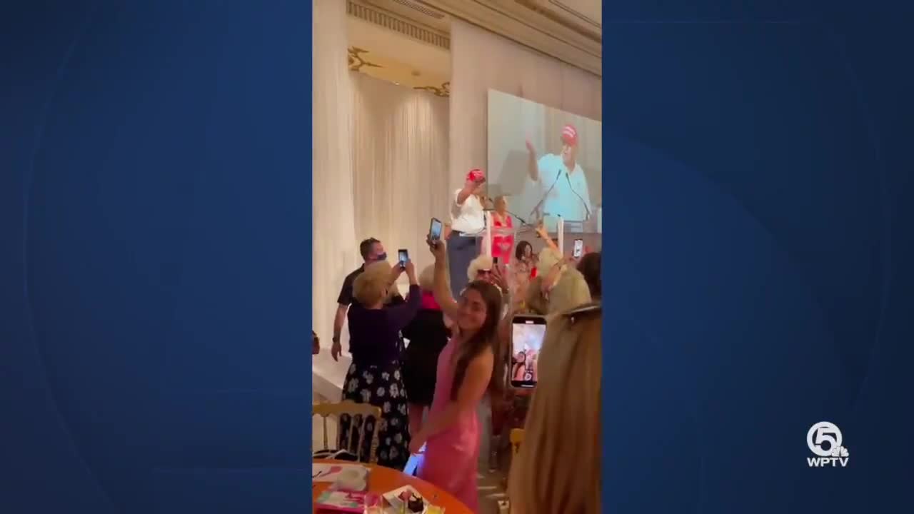 President Donald Trump made an unannounced visit to a dog rescue fundraiser in Palm Beach on Friday.