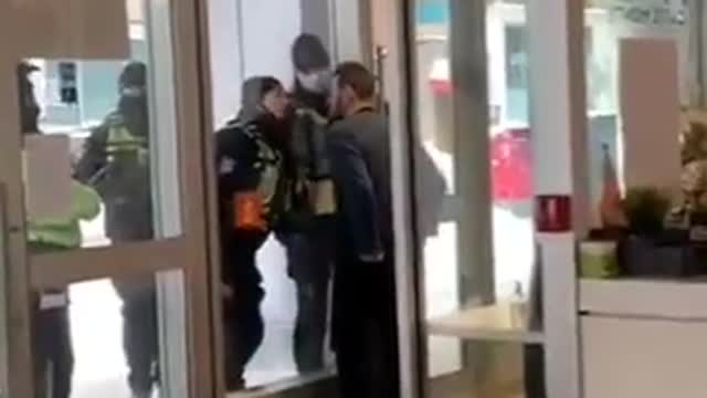 NAZI WORLD ORDER POLICE surrounding the iconic cafe in Ottawa today