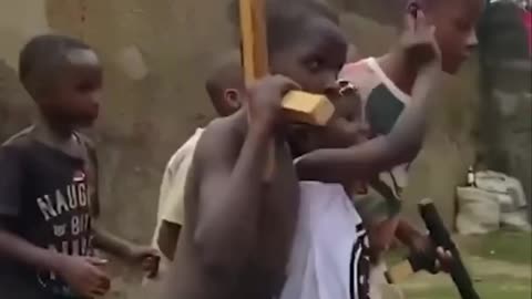 Ugandan Kids Reenact Trump Assassination Attempt