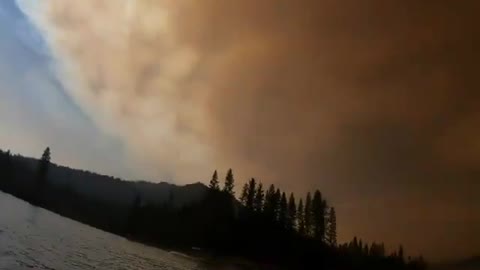 Smoke completely covers Bass Lake in California