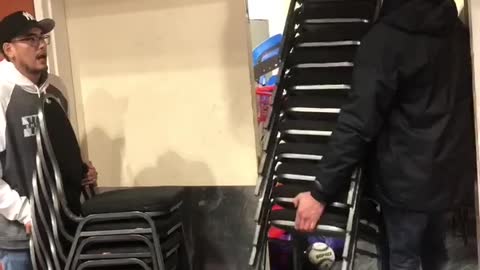Chair Stack Movement Shocks Onlooker