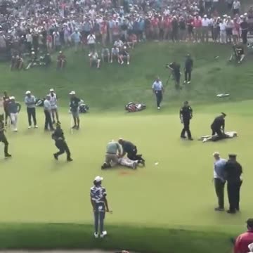 Fury as eco zealots storm golf course moments before crucial Scottie Scheffler putt at Travelers