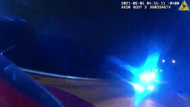 Incredible Moment Stationary Police Car Suddenly Smashes Into Cop Standing on Motorway