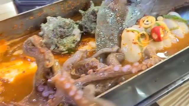 Very large braised cutlassfish and octopus dish