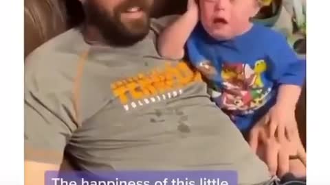 The happiness of this little boy when he sees his little brother