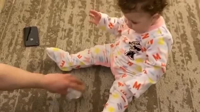 This very lucky toddler, being able to make a bottle stand up, is amazing