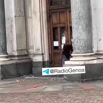 In Italy, cultural enrichment armed with stones attacks a church, destroying the door.
