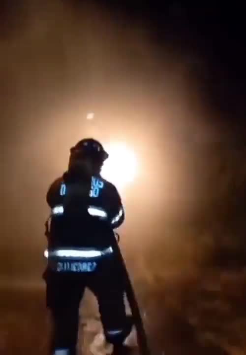 Firefighter putting out the fire