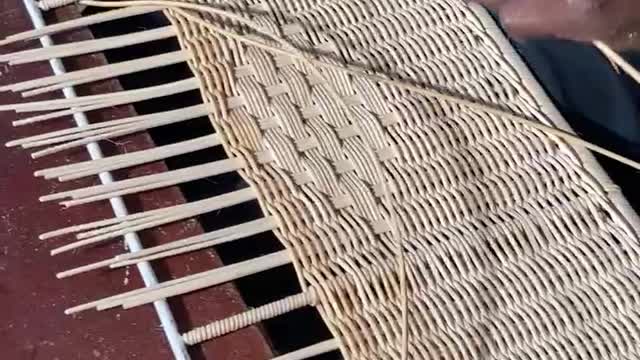 Rattan weaving on panels.