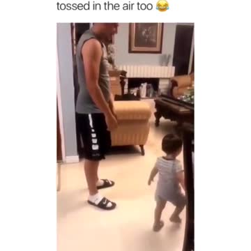 Dog wants to get tossed in the air like baby!