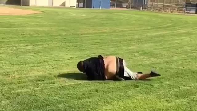 Big guy black shirt flips in park