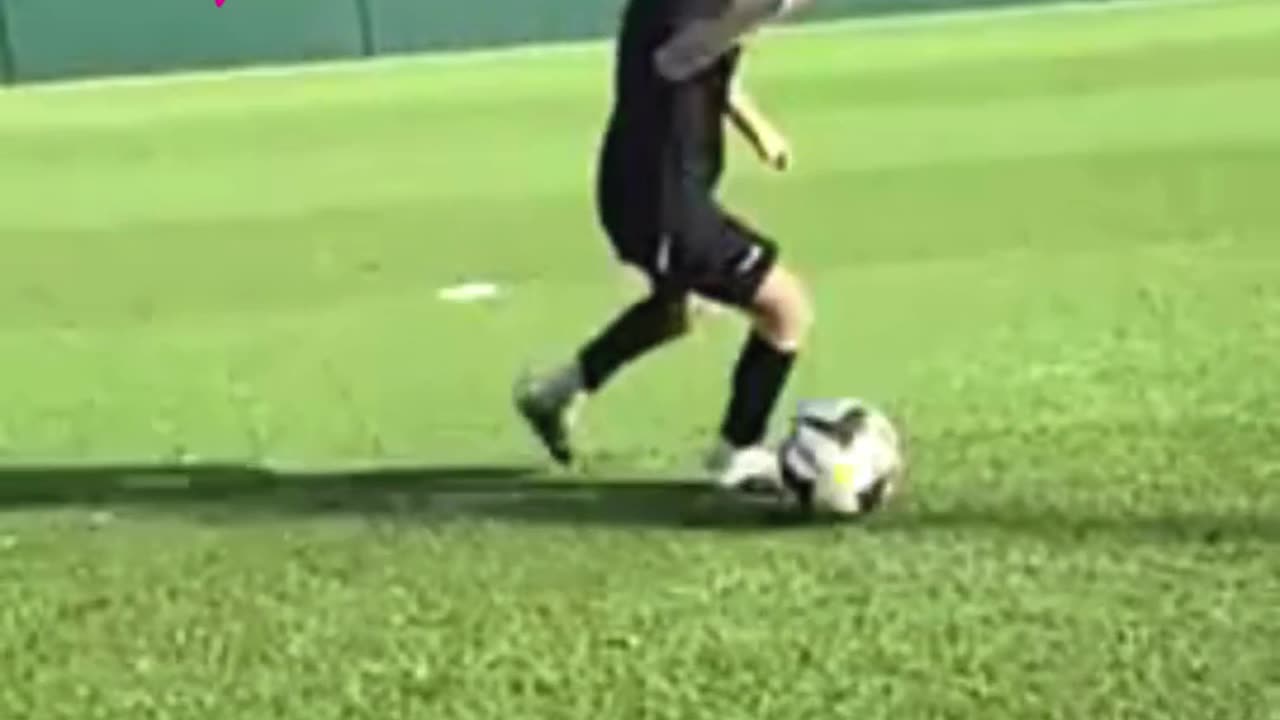 Little footballer practicing football