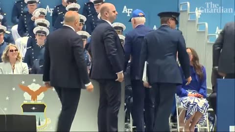 Joe Biden falls during a ceremony