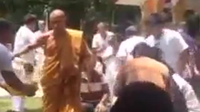 Baba bless people with hitting on heads