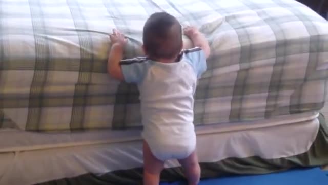 8 Months old baby climb on to Bed