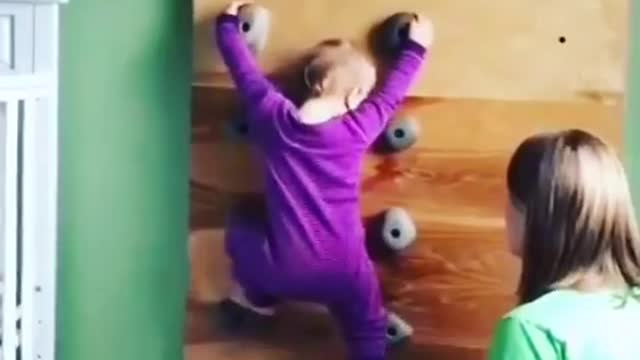 Mom teaching her cute baby