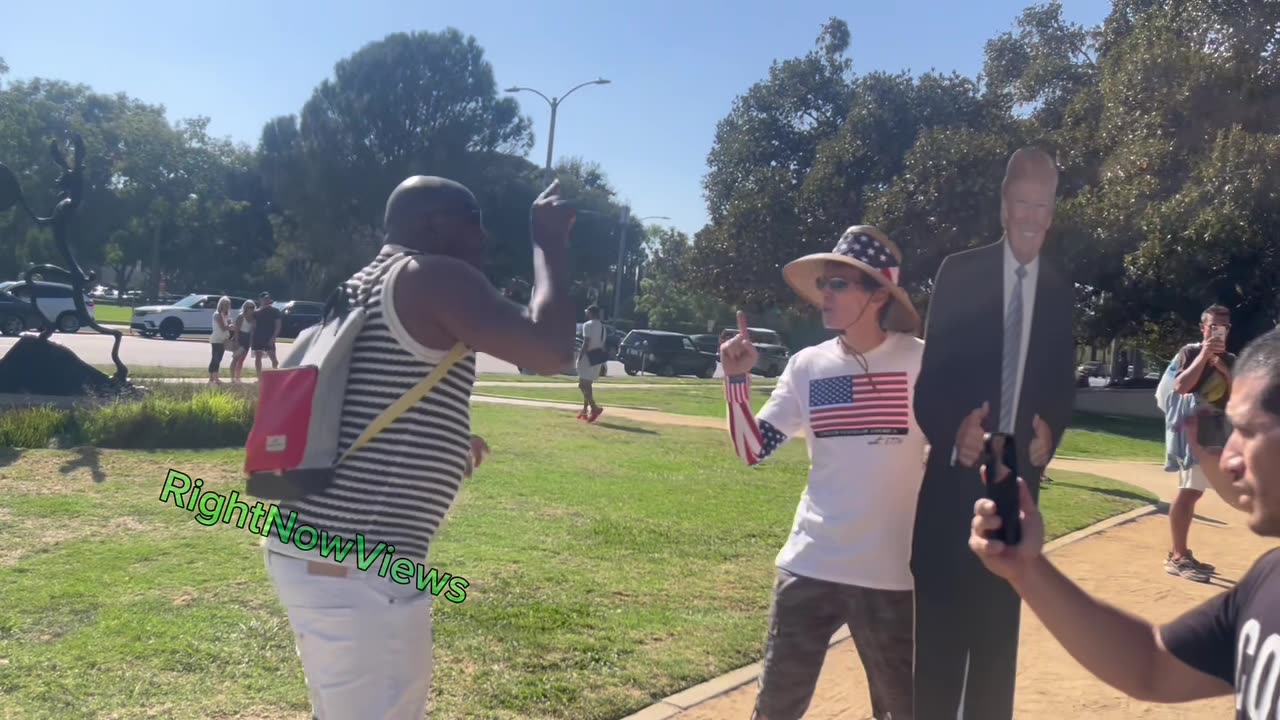 Two men attempt to heckle Trump supporters after being triggered by their presence in Beverly Hills.