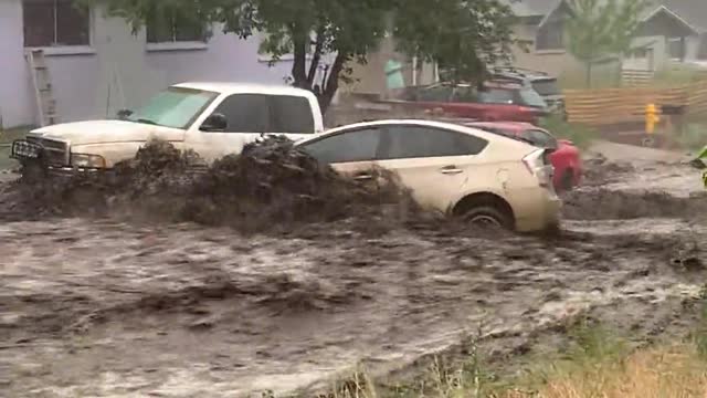 Intense Flooding Carries Cars Away