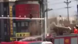Chinese suicidal man saved by firefighters