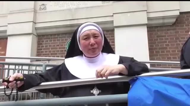 Nun speaks once again as London's Anti-Lockdown march passes