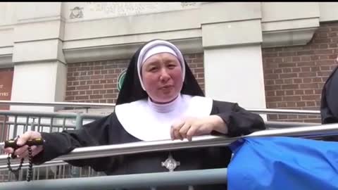 Nun speaks once again as London's Anti-Lockdown march passes
