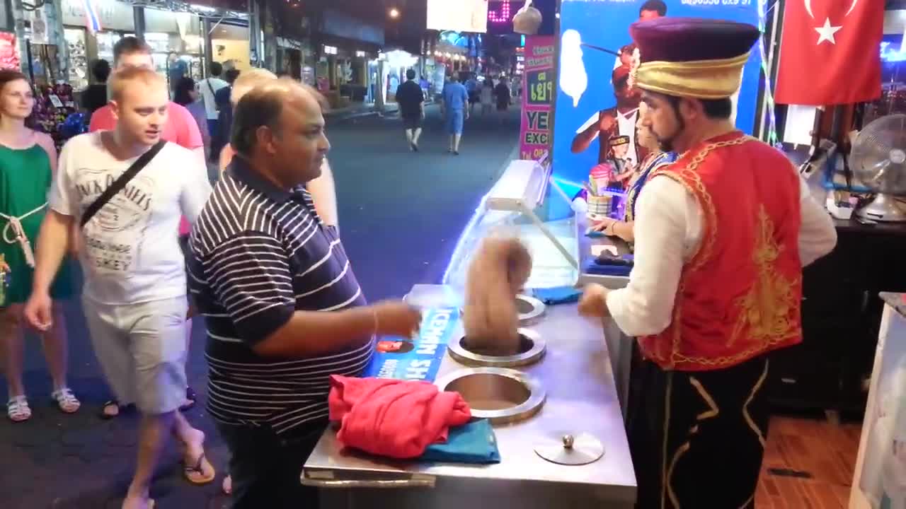 Smart Turkey ice cream seller at walking street