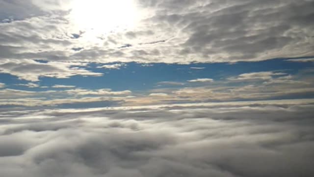 Flying Between The Clouds