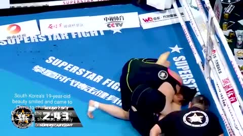 South Korean 19-year-old beauty smiles and challenges Lady Enforcers.