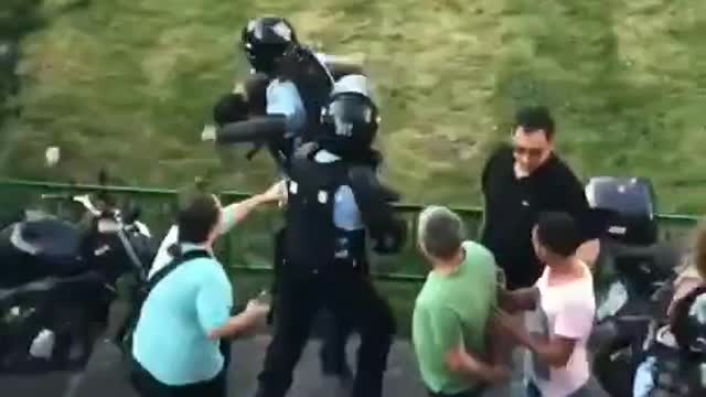 Fed up protester kicks a police in a Jet Li style.