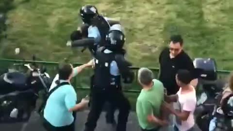 Fed up protester kicks a police in a Jet Li style.