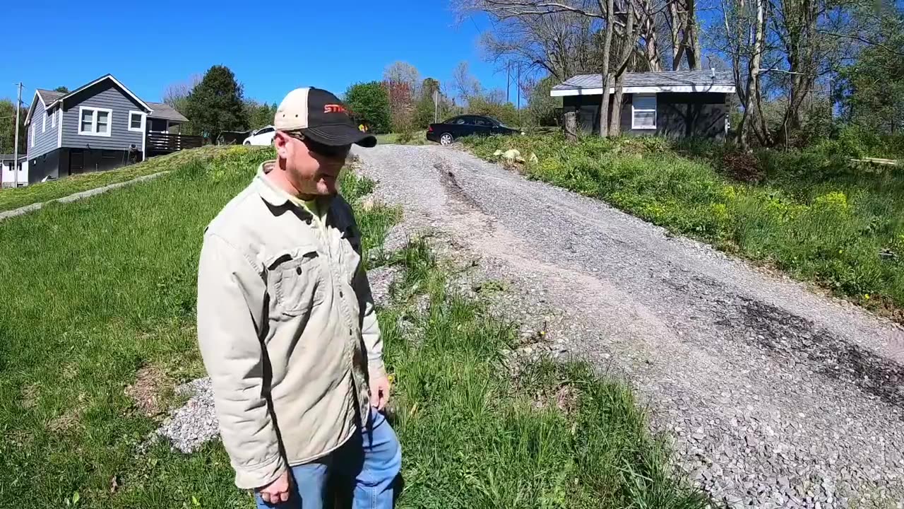 Fixing our own driveway after heavy rains