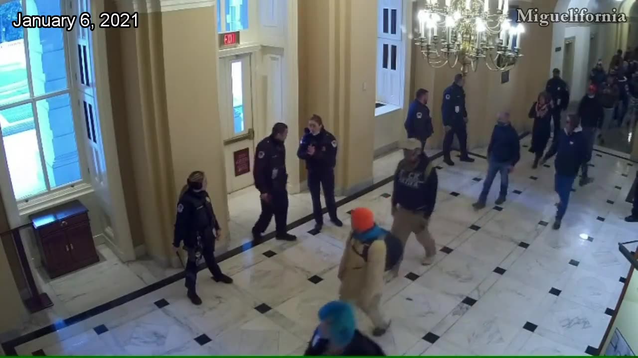 J6 Capitol Police clear hall for people to walk through