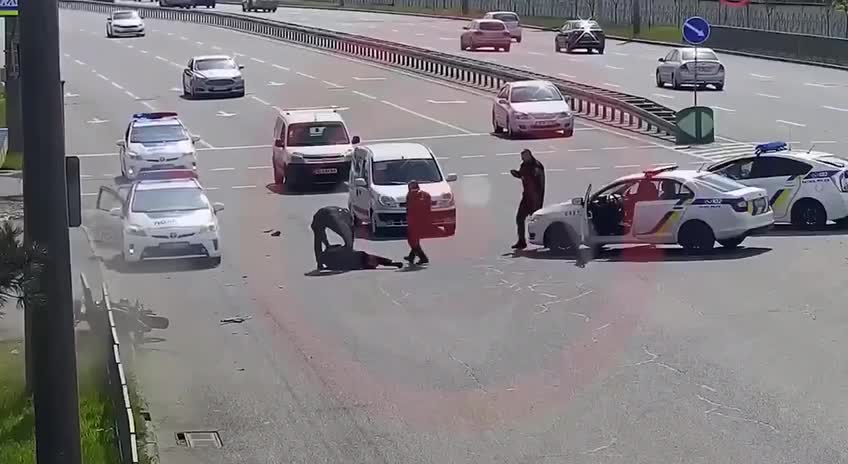 Dnipro, Ukraine, a motorcyclist tried to slip past a police checkpoint.