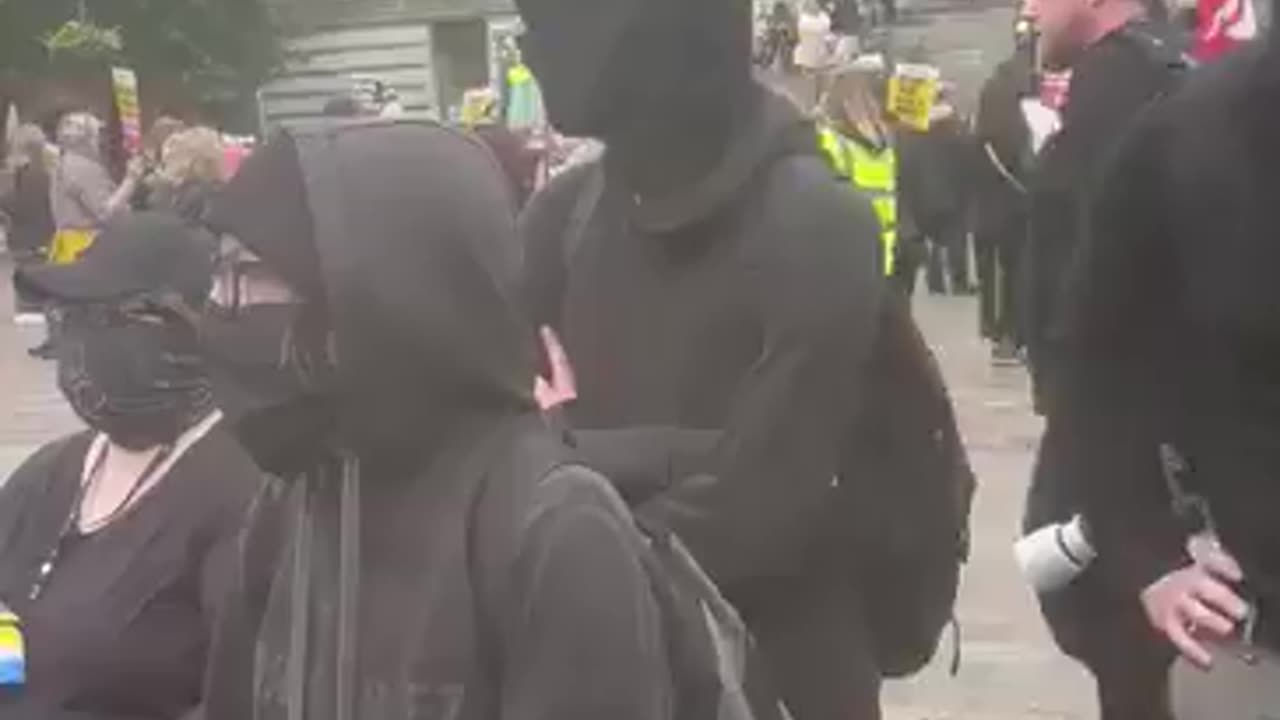 Masked ANTIFA thugs and patriots face off in Portsmouth today at the Enough