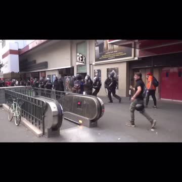 French police forced into retreat.