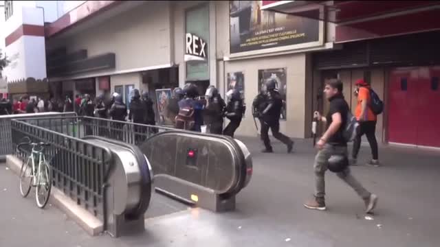French police forced into retreat.