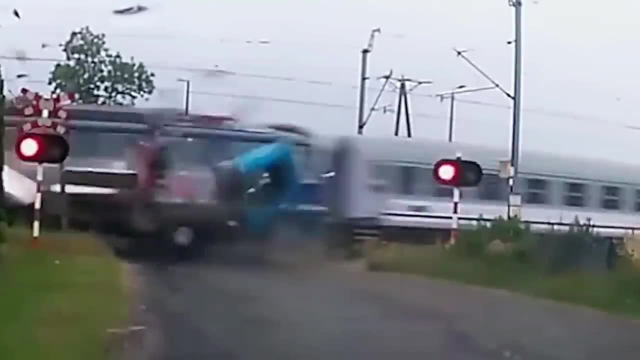 Truck stuck on Railway Tracks gets Smashed by Train