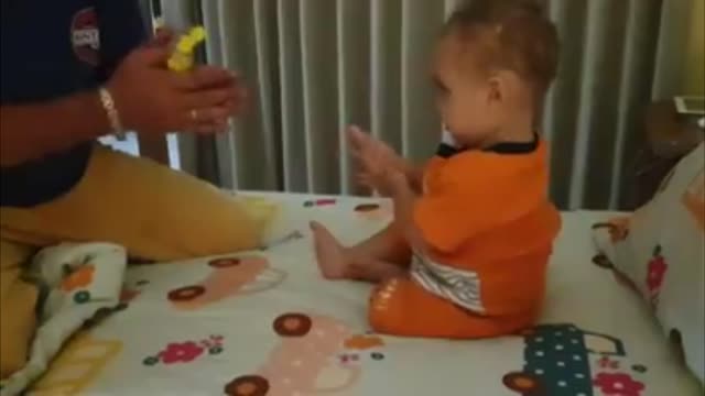 Dad Teaches Toddler Son To Disinfect His Hands