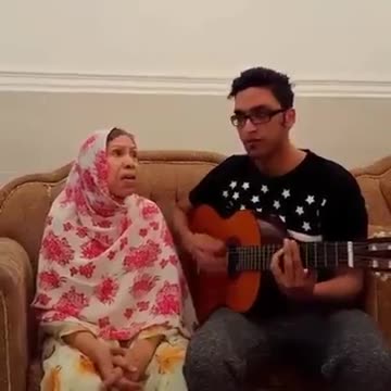 Mother and her son singing a traditional song