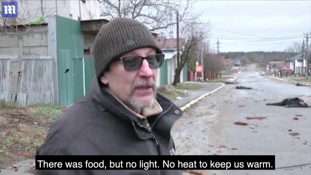 Ukraine Viral Footage- Survivor reacts to dead bodies in the streets of Bucha