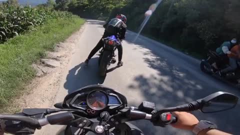 Bikers touch by car accidently