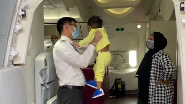 Baby first time traveling in flight so little scared