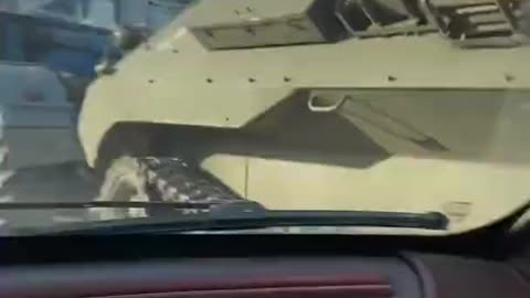 UKRAINE: Civilians Attack Russian Tank With Molotov Trought The Window Of A Moving Car !!!