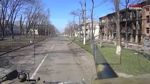 A tank fires at the positions of militants who have settled in a residential building in Mariupol