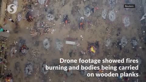 Drone footage shows non-stop mass cremations in New Delhi