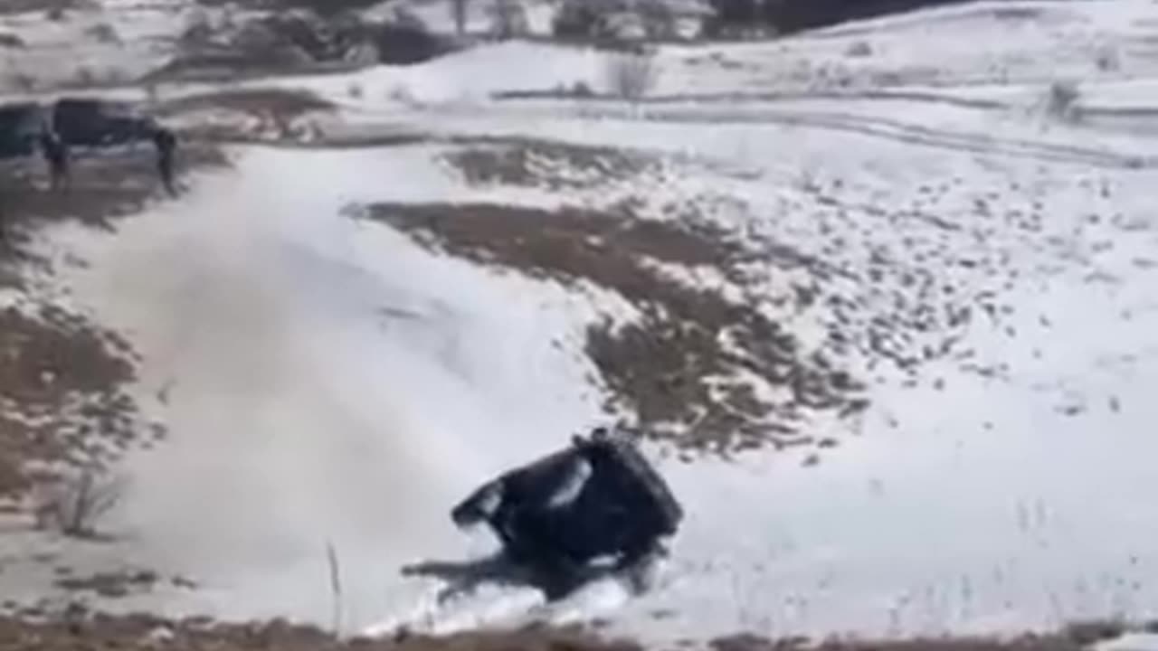 Off-Roading Rollover In Snow