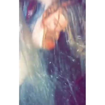 Falling with the fountain and its refraction