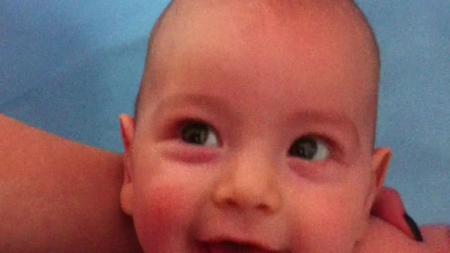 Baby is laughing while bathing. so cute!