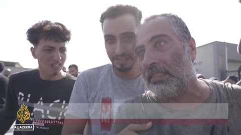 Gaza workers Palestinians return from Israeli captivity