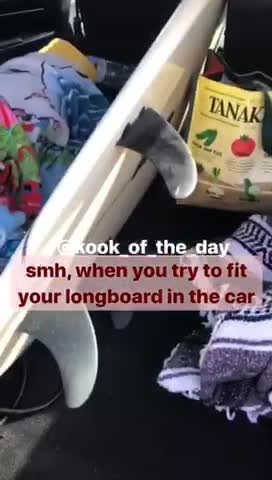 Boomerang video of a surfboard not fitting in a car